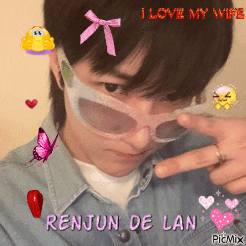 a picture of a man wearing sunglasses with the words i love my wife written on it