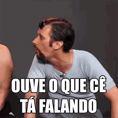 a man with a beard and sunglasses on his head says ouve o que ce ta falando