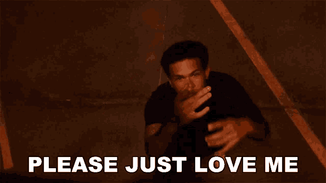 a man is saying please just love me in a dark room