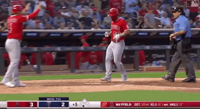 a baseball game is being played between the angels and the padres