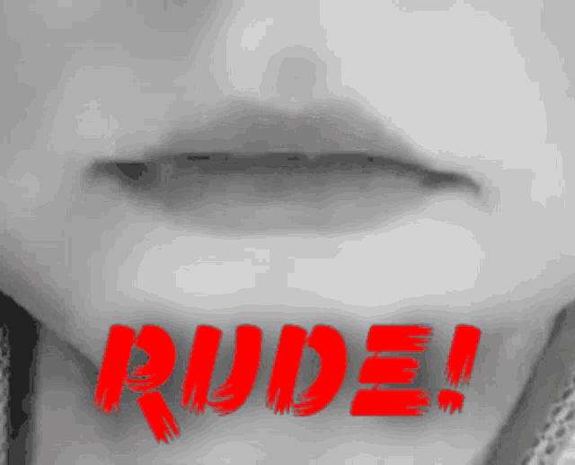 a close up of a person 's mouth with the word rude written on it