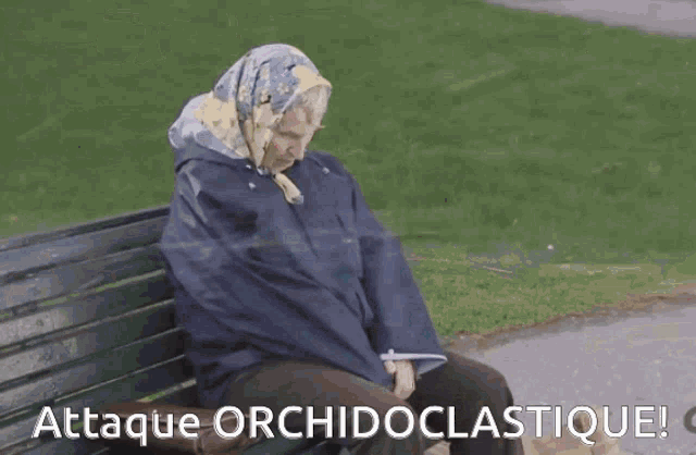 a person laying on the ground with a bag that says " attaque orchidoclaistique "