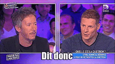 two men are talking in front of a crowd and the words dit done are on the screen