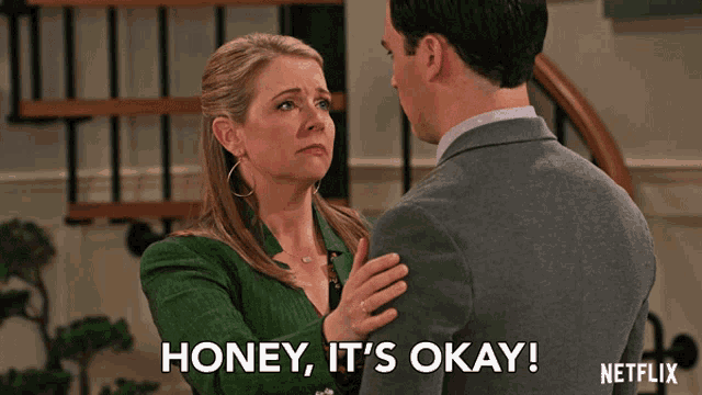 a man and woman are hugging and the woman says honey it 's okay netflix