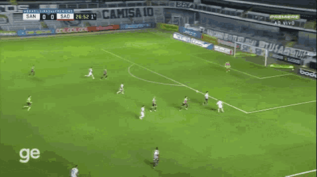 a soccer game is being played in a stadium with a banner that says bodog