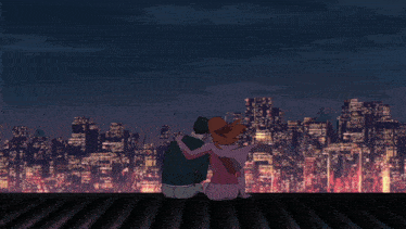 a man and a woman are sitting on a rooftop looking at a city skyline at night