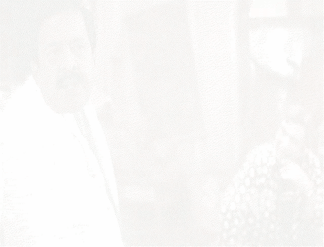 a man with a mustache is wearing a white shirt