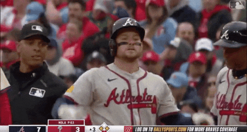 a baseball player wearing a jersey that says atlanta