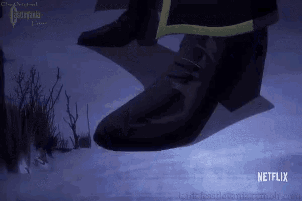 a netflix advertisement with a person 's feet in the snow