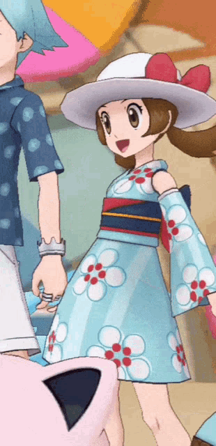 a girl in a blue dress and white hat stands next to a boy