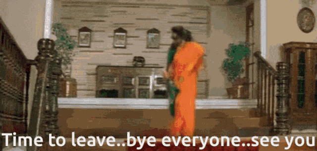 a woman in an orange saree is dancing in a room with the words " time to leave bye everyone see you "
