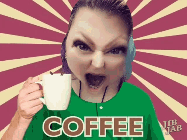 a woman in a green shirt is holding a white cup of coffee