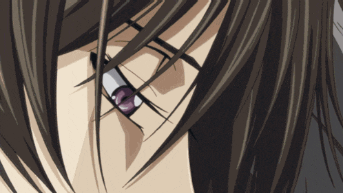 a close up of a person 's eye with a purple eye