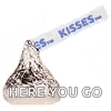 a hershey kiss with a ribbon that says `` here you go '' on it .