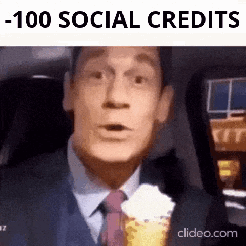 a man in a suit and tie is holding an ice cream cone in his hand .