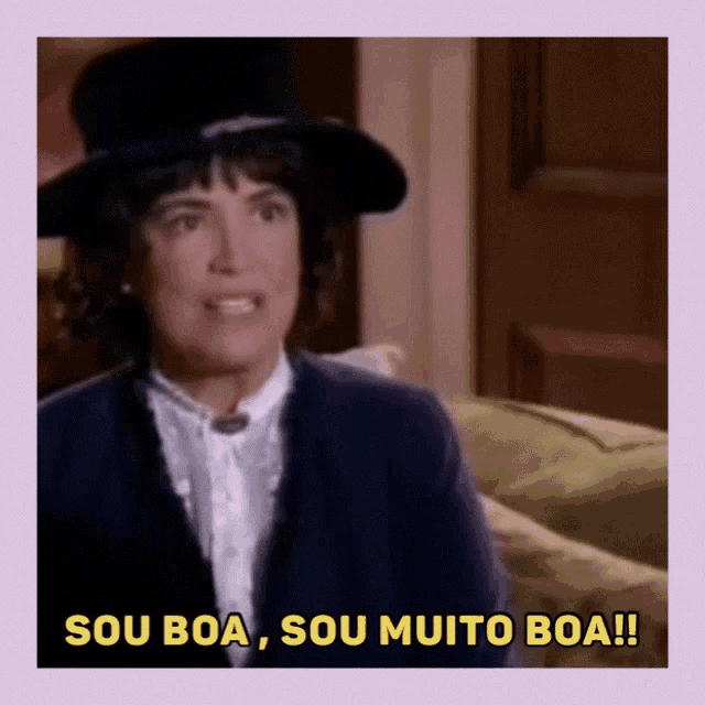 a woman wearing a top hat says sou boa