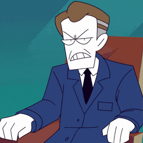 a man in a suit and tie is sitting in a chair