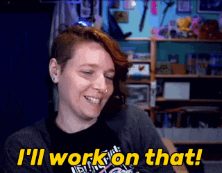 a woman is smiling and says i 'll work on that .