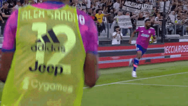 a soccer player with the number 12 on their back