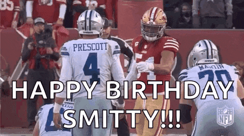 a group of football players standing next to each other on a field with the words `` happy birthday smithy ! ''