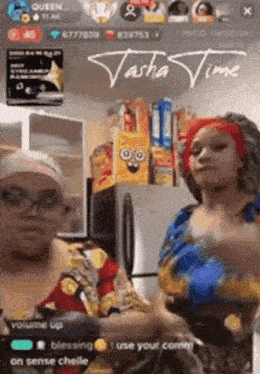 two women are standing next to each other in front of a refrigerator .