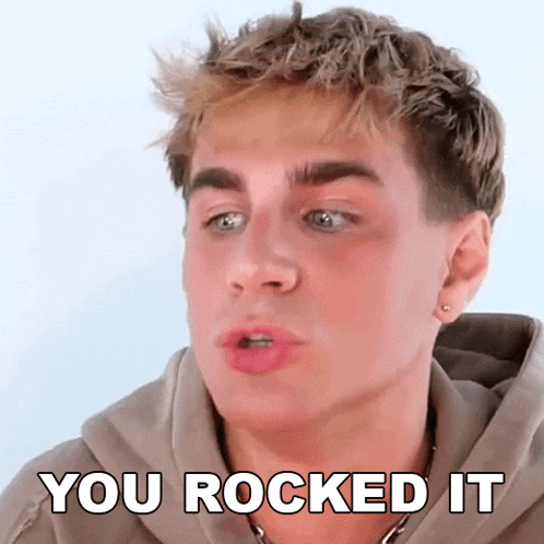 a young man is making a funny face and saying " you rocked it "