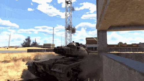 a tank is driving past a building with a tower in the background
