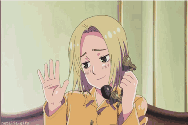 a picture of a girl talking on a phone with hetalia-gifs in the bottom right corner