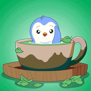a penguin is in a cup of green tea