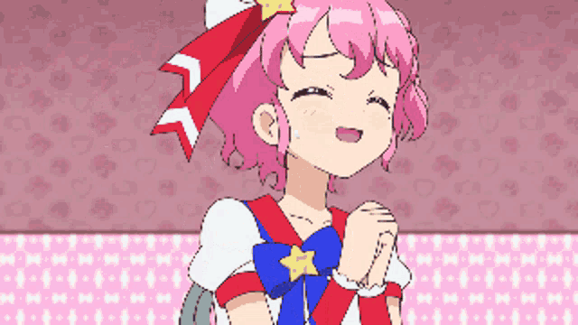 a pixel art drawing of a girl with pink hair and a star in her hair