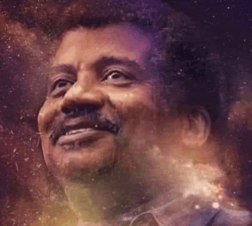 a man with a mustache is smiling in front of a colorful background of stars .