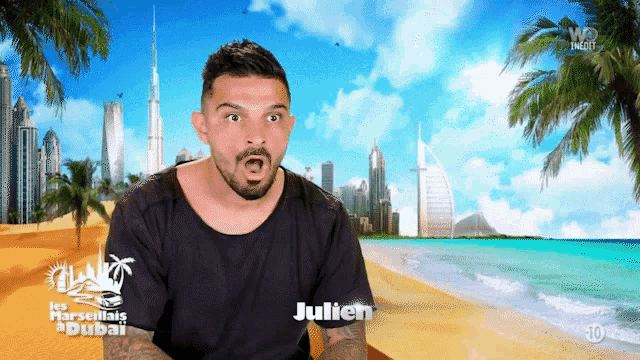 a man in a black shirt with julien written on the front