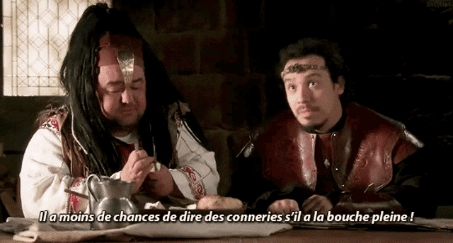 two men sitting at a table with a caption that says il a moins de chances de dire des conneries