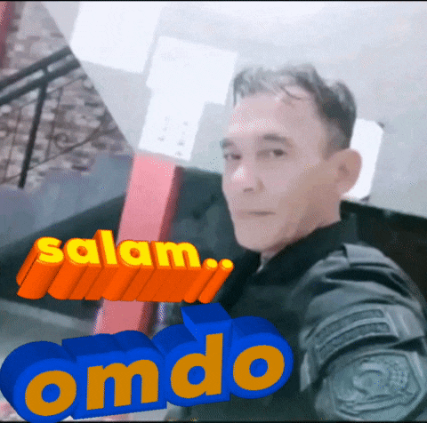 a man taking a selfie with the words salam omdo on the bottom