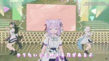 a group of anime girls are dancing on a stage in front of a sign that says ' 5th anniversary '