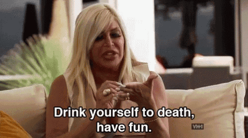 a woman is sitting on a couch talking about drinking yourself to death .