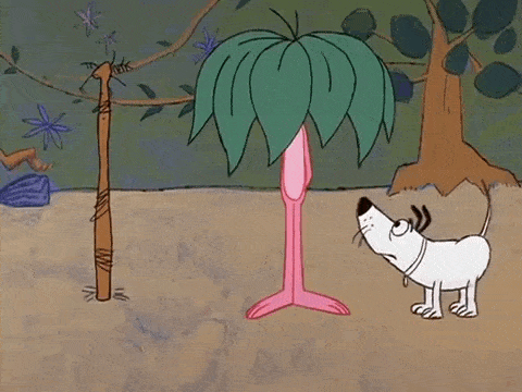 a pink panther is holding a gun while a dog looks on