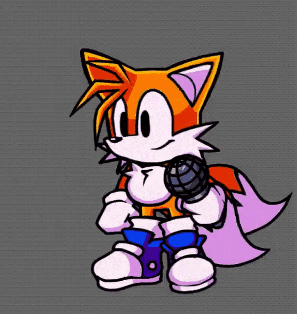 tails from sonic the hedgehog is holding a microphone .