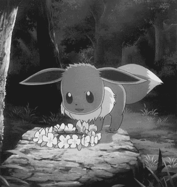 a black and white photo of a pokemon eevee standing on a rock with flowers .
