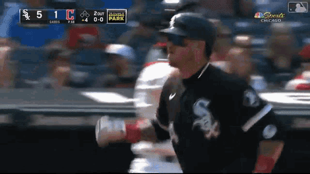 a baseball game is being played in chicago and the score is 5 to 1
