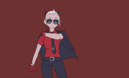 a man is standing in front of a large red monster