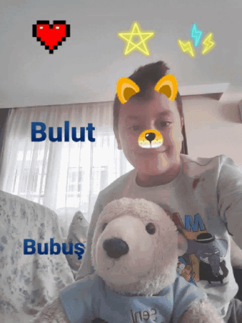 a boy holding a teddy bear with bulut and bubus written on the bottom