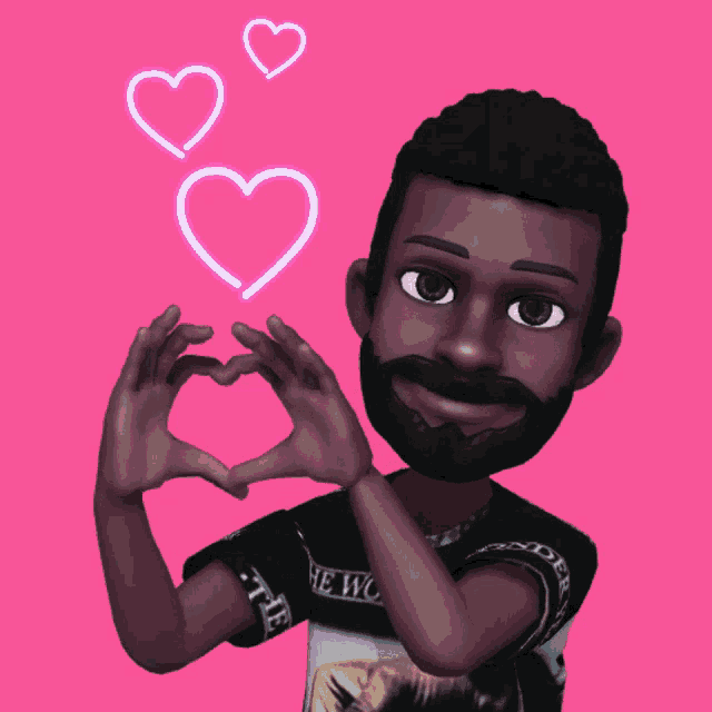 a man wearing a black shirt that says the world makes a heart with his hands