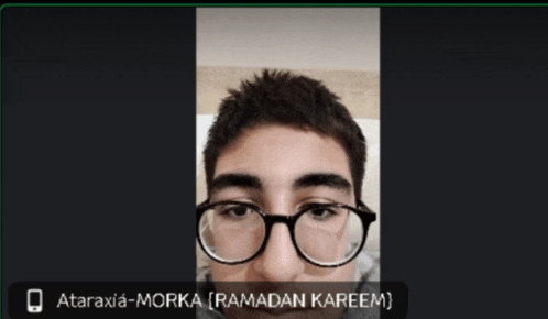 a picture of a man with glasses and the name ataraxia-morka ramadan kareem