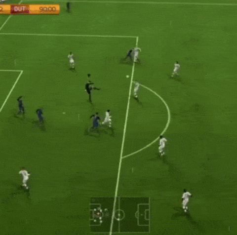 a soccer game is being played and the score is 2 to 1