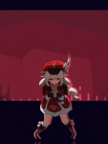 a girl in a red dress is dancing in front of a red background .