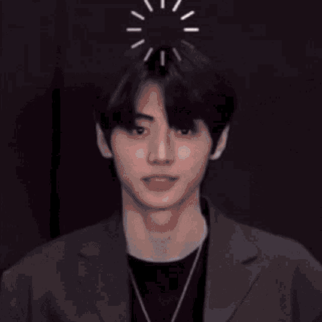 a close up of a person 's face with a clock spinning on their head .