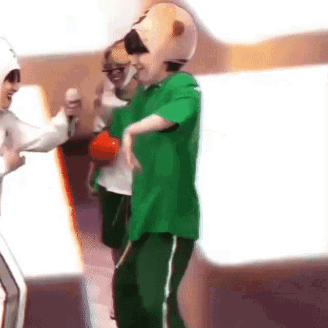 a person wearing a green shirt and a teddy bear mask is dancing .