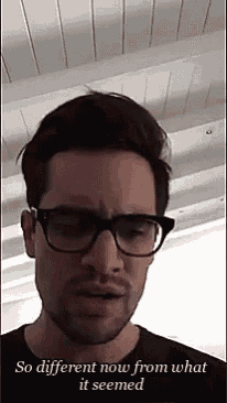 a man wearing glasses and a black shirt says so different now from what it seemed .