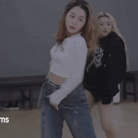 a woman in a white crop top with the word sculptor on it